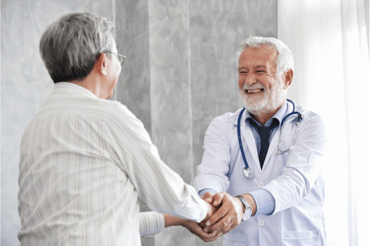 Specialist fills out forms during preventative care visit